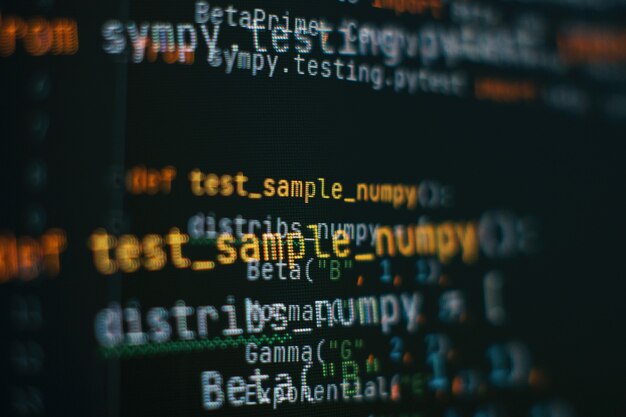 abstract computer script code. programming code screen of software developer. software programming work time. code text written and created entirely by myself.