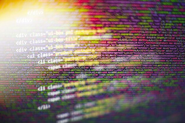 abstract computer script code. programming code screen of software developer. software programming work time. code text written and created entirely by myself.