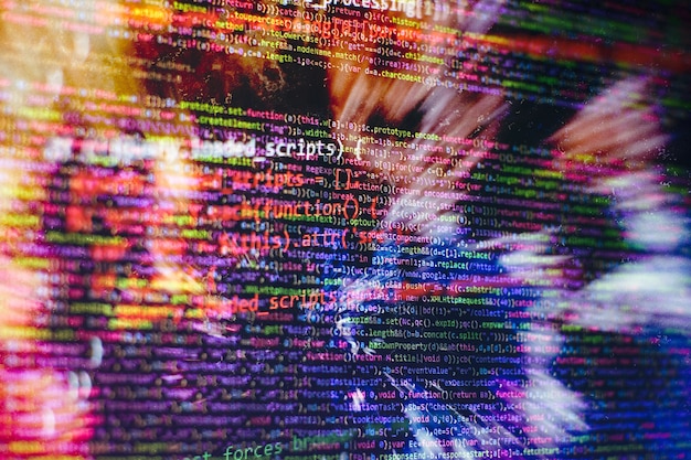 abstract computer script code. programming code screen of software developer. software programming work time. code text written and created entirely by myself.