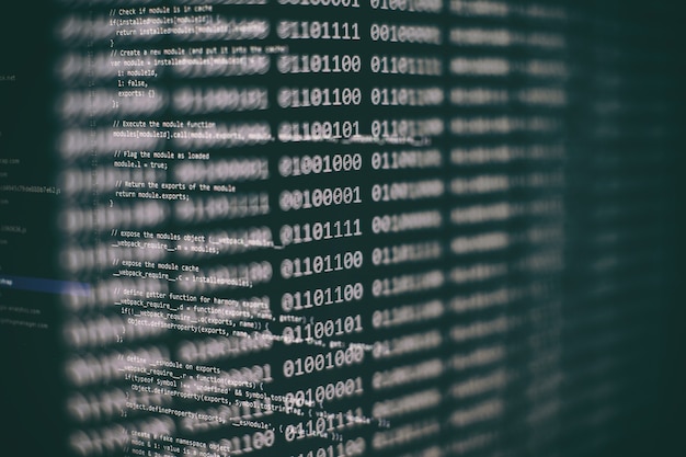abstract computer script code. programming code screen of software developer. software programming work time. code text written and created entirely by myself.