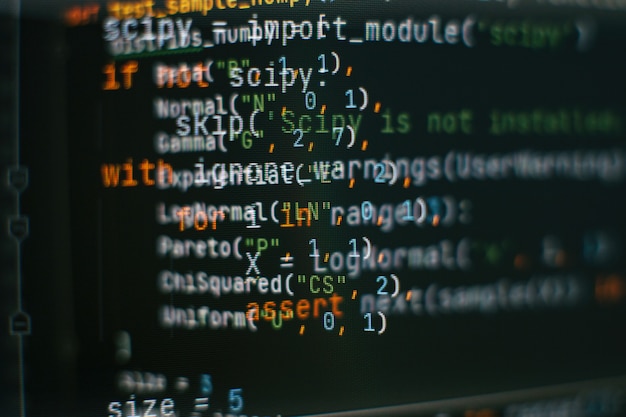 abstract computer script code. programming code screen of software developer. software programming work time. code text written and created entirely by myself.