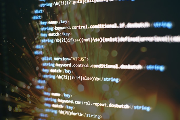 abstract computer script code. programming code screen of software developer. software programming work time.