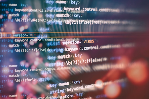 abstract computer script code. programming code screen of software developer. software programming work time.