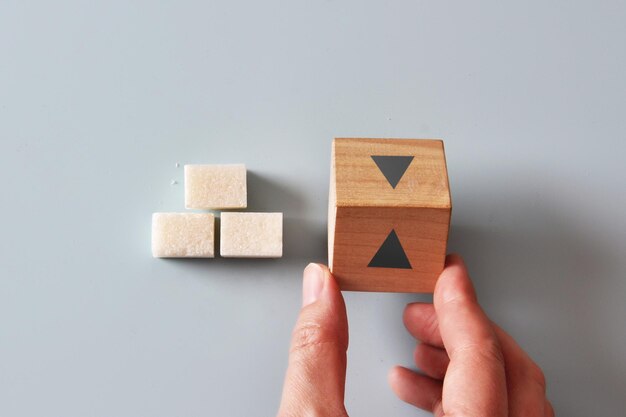 blood sugar increase and decrease concept with cubes and arrows