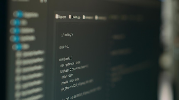 computer display of software developer typing database functions script on terminal window, cloud computing. displaying source code and hmtl script with it coding or programming language. close up.