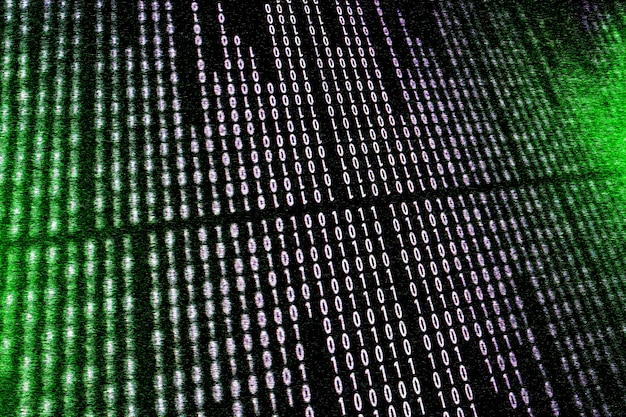digital binary data and streaming binary code on computer screen.