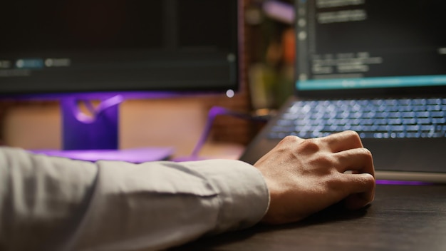 freelancer programming binary code on software server, coding encryption system with firewall application. hacking security program on network script for development. close up. .