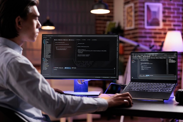 male freelancer programming server encryption on firewall software, using security network interface to code system data for app development. working with binary code text to script program.