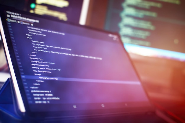 monitor closeup of function source code abstract it technology background software source code