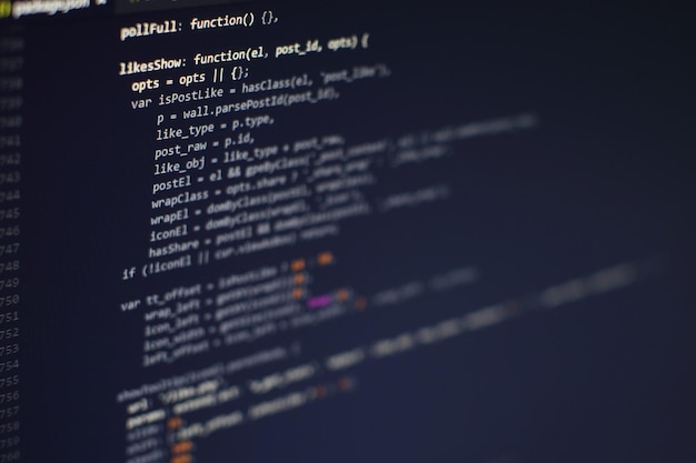 programming code on computer screen. software development. writing program code on computer.