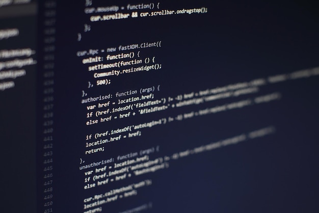 programming code on computer screen. software development. writing program code on computer.