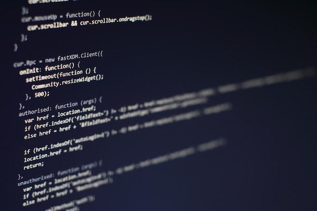 programming code on computer screen. software development. writing program code on computer.