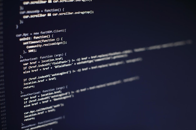 programming code on computer screen. software development. writing program code on computer.