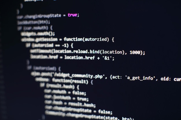 programming code on computer screen. software development. writing program code on computer.