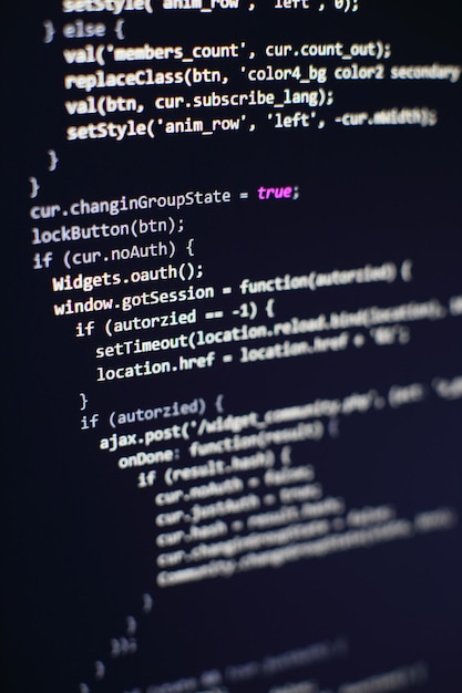 programming code on computer screen. software development. writing program code on computer.