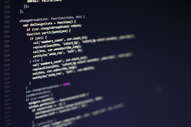 programming code on computer screen. software development. writing program code on computer.