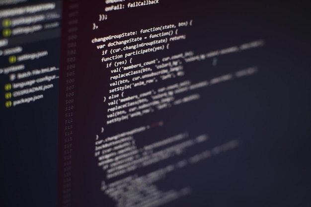programming code on computer screen. software development. writing program code on computer.