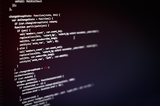 programming code on computer screen. software development. writing program code on computer.