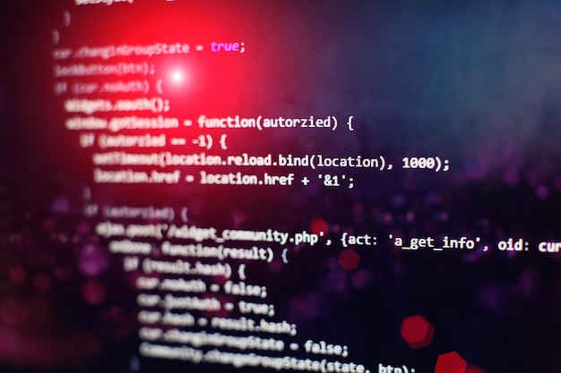 programming code on computer screen. software development. writing program code on computer.
