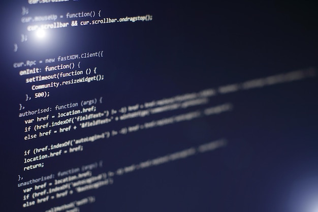programming code on computer screen. software development. writing program code on computer.