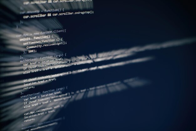 programming code on computer screen. software development. writing program code on computer.