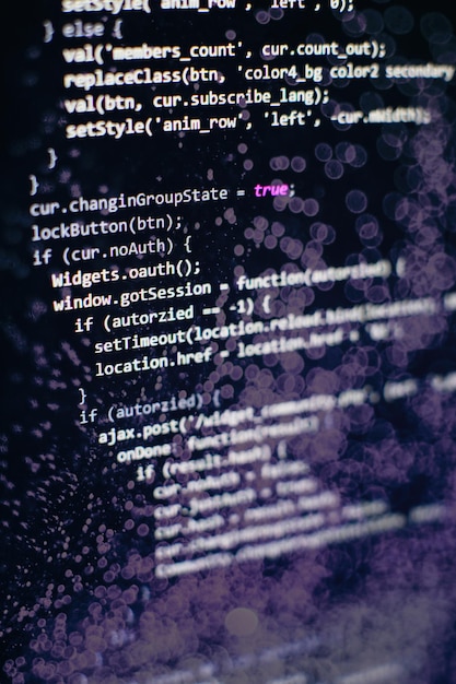 programming code on computer screen. software development. writing program code on computer.