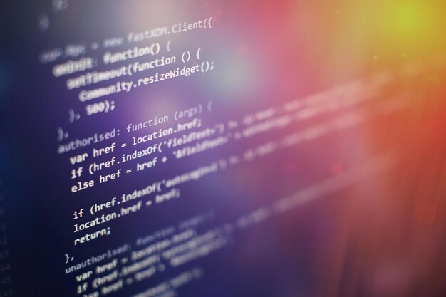 programming code on computer screen. software development. writing program code on computer.