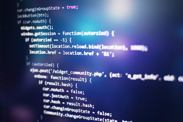 programming code on computer screen. software development. writing program code on computer.