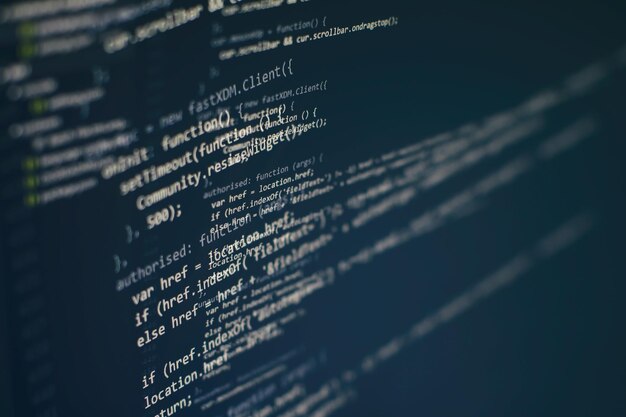 programming code on computer screen. software development. writing program code on computer.