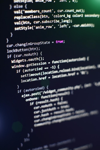 programming code on computer screen. software development. writing program code on computer.