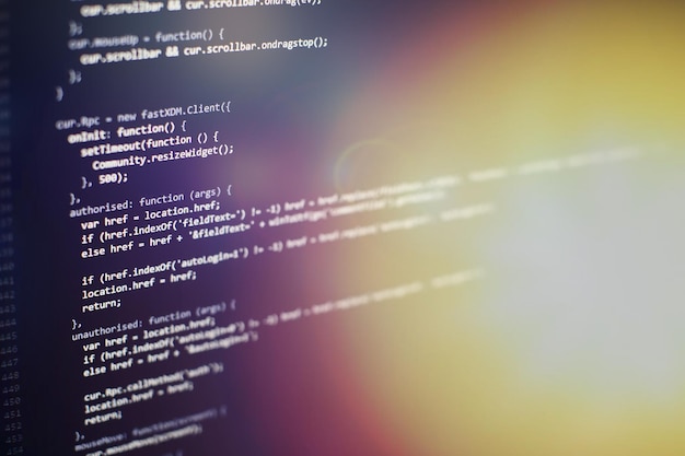 programming code on computer screen. software development. writing program code on computer.
