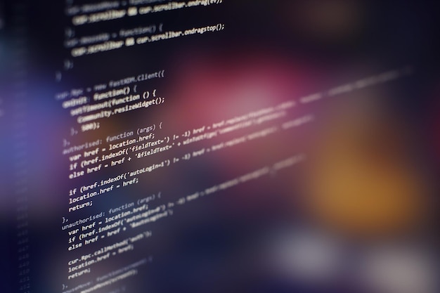 programming code on computer screen. software development. writing program code on computer.