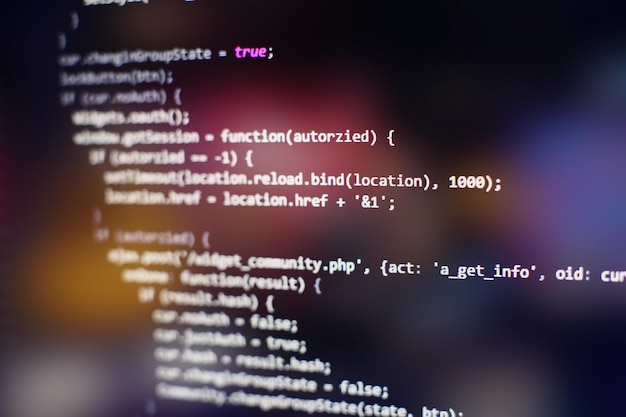 programming code on computer screen. software development. writing program code on computer.