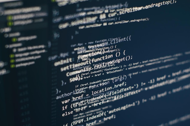 programming code on computer screen. software development. writing program code on computer.