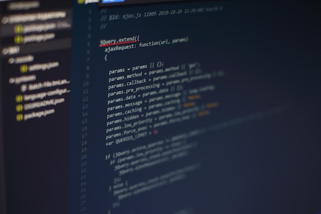 programming code on computer screen. software development. writing program code on computer.
