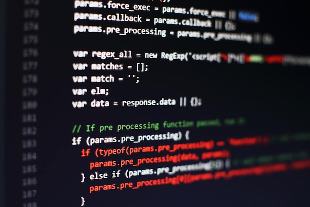 programming code on computer screen. software development. writing program code on computer.