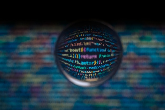 software developer code abstract computer script code code in a glass ball