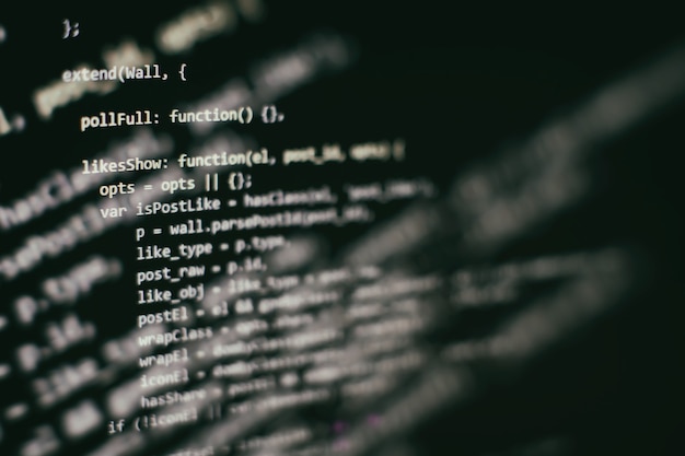 software developer programming code. abstract computer script code. selective focus