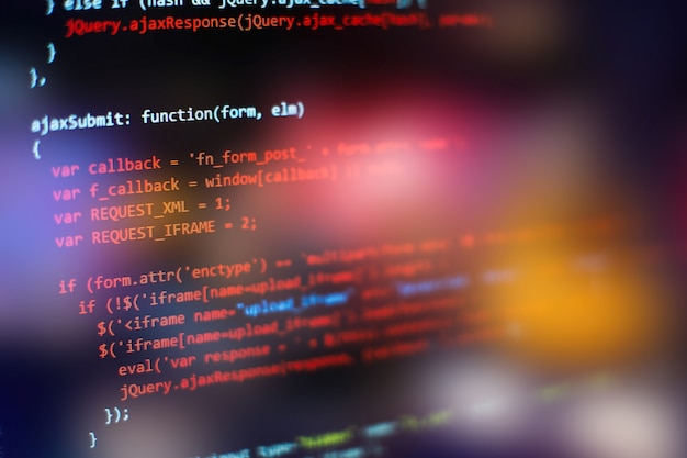software developer programming code. abstract computer script code. selective focus