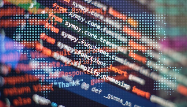 software developer programming code abstract computer script code selective focus