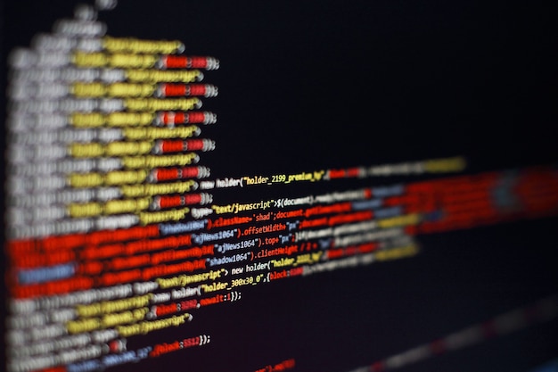 software developer programming code. abstract computer script code. selective focus