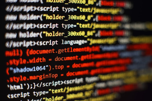 software developer programming code. abstract computer script code. selective focus