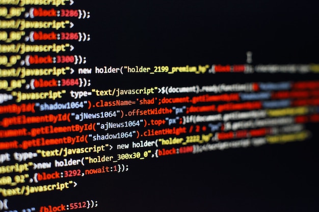 software developer programming code. abstract computer script code. selective focus