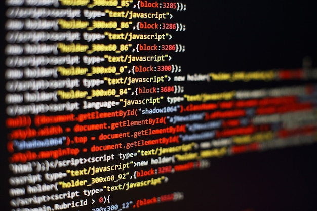 software developer programming code. abstract computer script code. selective focus