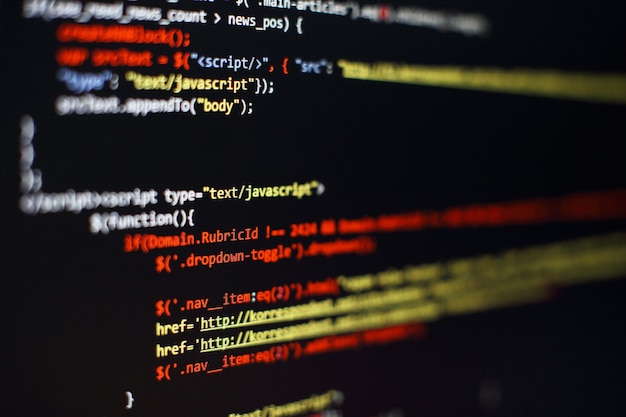 software developer programming code. abstract computer script code. selective focus