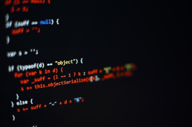 software developer programming code. abstract computer script code. selective focus