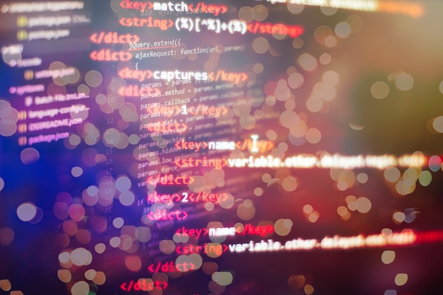software developer programming code. abstract computer script code.