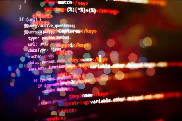 software developer programming code. abstract computer script code.