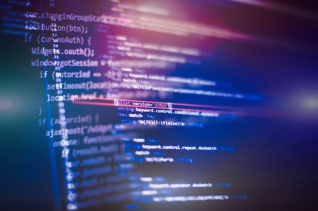 software developer programming code. abstract computer script code.