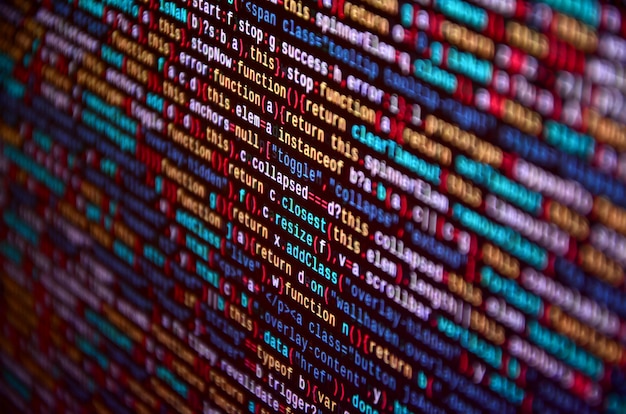 software developer programming code on computer. abstract computer script source code